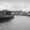 General view looking ESE showing ships in dock