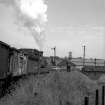 View showing coal train with J36 locomotive on track near station