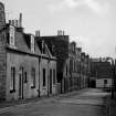View from NNW showing WSW front of numbers 1-27 Elgin Place with number 1a Sutherland Street in background