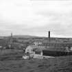 General view from NE showing tannery with church in background