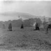 General view of the circle.
Original negative captioned 'Rothiemay Stone Circle from the north'.
Print card captioned 'West side, in early morning, shortly before sunrise, with rising mists.'