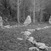 Detail of inner stone settings.
Original negative captioned: 'Garrol Wood Stone Circle. Outer circle joining the standing stones and inner ring of stones Sep 17th 1904'.
