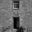 Edinburgh, 8 Dewar Place.
Detail of the doorway on the South facade showing datestone '1940'.
