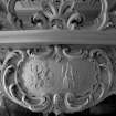 Interior detailed view of the decoration on the mantelpiece of the West fireplace in the drawing room on the first floor, showing painter and sculptor dogs at work.