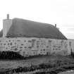 General view of thatched cottage.
Digital image of IN/5742