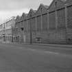 View from SE showing part of SSW front of numbers 477-519 Shettleston Road