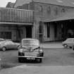 View looking NE from Aikenhead Road showing 'Morris Minor' in yard