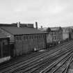 General view from E showing NE front (railway front) of works