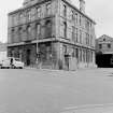 View from W showing NW and SSW fronts of office block