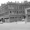 View from SSE showing SSW front and part of SE front of numbers 46-54 Ingram Street with Albion Buildings in background