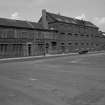 General view from WSW showing SSW front (French Street front) and part of WNW front (Norman Street front)