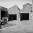 View from E (Hydepark Street) showing part of ESE front of weaving sheds