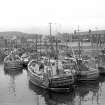 View looking SE showing boats in harbour with part of Girvan in background