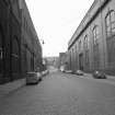 View looking NNE showing part of engine works on right and part of boiler works on left