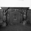 Batterflatts House. Detail of fireplace supported by carved wooden caryatids in the form of children, in the dining room.
