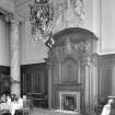 Central Station, Glasgow. Detail of ornate fireplace in Dining Room, including marble corinthian column and elaborate light fitting.
