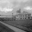 General view of rear elevation with conservatory to left
