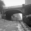 View from W showing WNW front of arch over Garnochmill Road