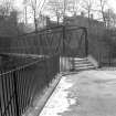 View from SE showing SSW and ESE fronts of bridge with station in background