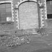 View from SSW showing bricked up doorway on SSW front of main block