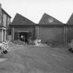 View from WNW showing part of WNW front of weaving sheds