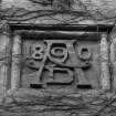 Detail of carved panel on the east facade of the music room.
Digital image of AY 3313.