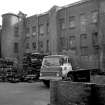 View from NW showing part of NNE front of oldest block