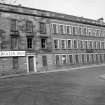 View from SSW showing SSE front (Mcphail Street front) and part of WSW front (Greenhead Street front)