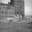 View from SE showing ESE front of warehouse with part of sawmill on left