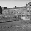 View from ENE showing ESE front of engine works with foundry on left and part of sawmill on right