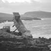 Photograph taken during coastal restorative work to build a breakwater for the future protection of Jarlshof. Foundations for wall W-E. Digital image of C/79128.