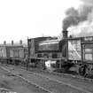 View from NW showing trucks and NCB locomotive number 19 near bridge and washery (not in picture)