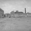 View from S showing ESE front of engineering works with part of boiler works workshop on left