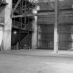 Interior
View showing strainer truss and central stanchion with sliding doors in background