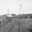 View looking ESE showing railway bridge with old bridge on right and hotel in background