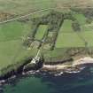 Oblique aerial view of Dunbeath Castle and grounds from E.