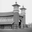 View of end block of of Princes Pier railway station, Greenock, showing flanking towers and curved entrance arch.
Closed to passengers in 1959.
