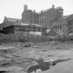 General view from WSW showing part of SSW and WNW fronts of workshop with Abercromby Home in background