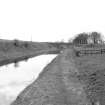 View looking WSW showing canal at Woodcockdale with bridge in background