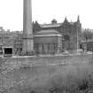 View from S showing SSW front and part of chimney