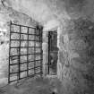Interior - second floor, eastern barrel vaulted cell, view from east. Digital image of B/39469.