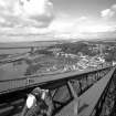 View of the West side of the North cantilever of the Fife erection seen from the South East with the Forth Road Bridge in the background.
Digital image of B 3244.