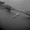 Oblique aerial view from the South West showing a cargo ship passing underneath the bridge.
Digtial image of WL 2982.