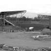 Scanned image of Perth, Crieff Road, McDiarmid Park Football Ground.
View of stadium under construction from WSW.
