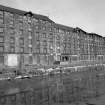 View from NW showing part of W front of City of Glasgow Grain Mills