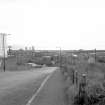 View looking ENE showing railway trucks with Methil Harbour in background and Swan Court on left