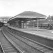 View from NE showing down platform building with part of up platform building on left and booking office in background