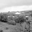 Distant view from WNW showing part of surface buildings