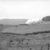 Distant view showing NCB locomotive number 21 and wagons at Minnivey