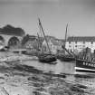 General view of Lower Largo Harbour with Crusoe Hotel and railway viaduct in the background.

